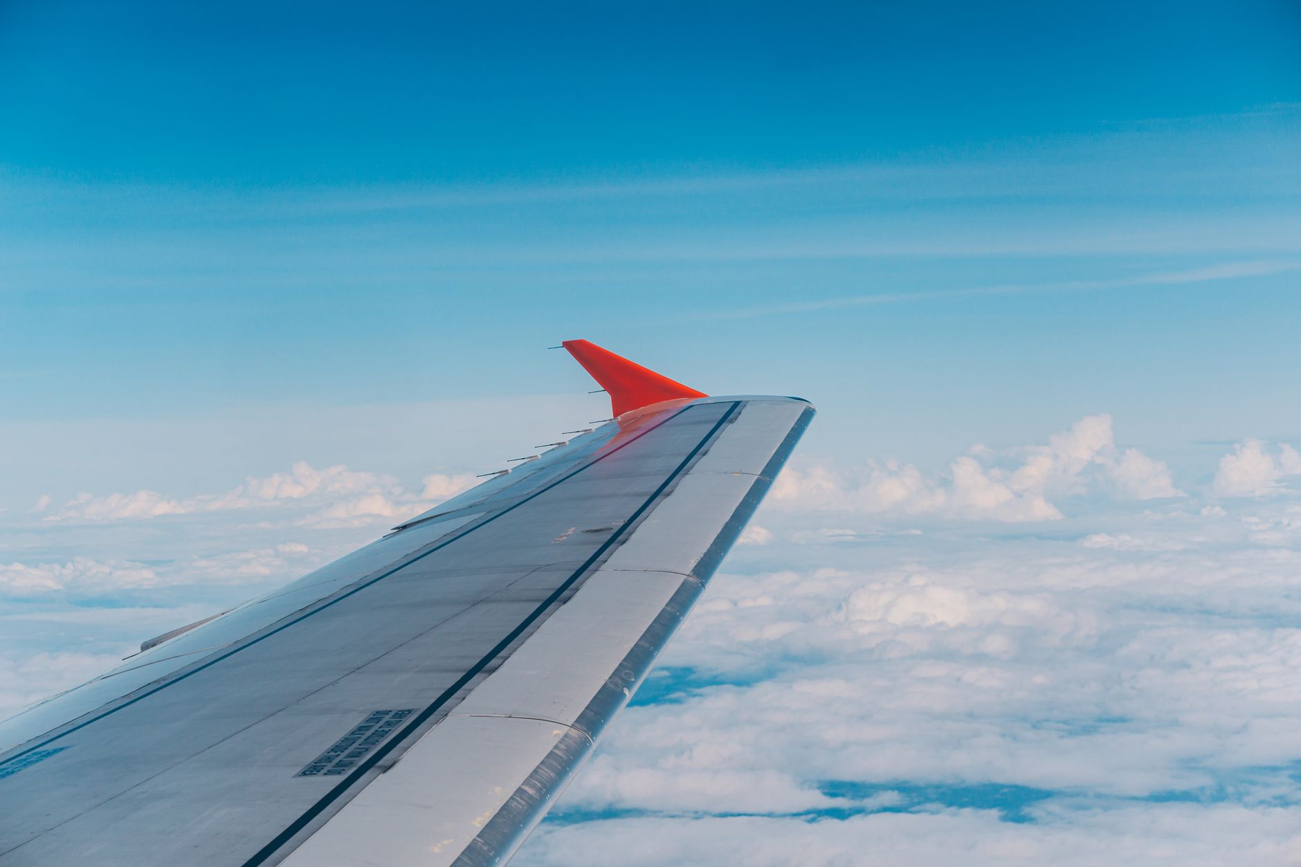 View of a plane departing Belfast Airport heading to Manchester, illustrating convenient short‑haul flights